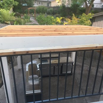 Eleven Construction Remodeling - View from upper deck to our outdoor kitchen - General Contractors Near Me