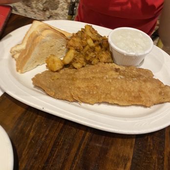 Gladys' Cafe - Fired fish with grits and potatoes - Caribbean Near Me - Charlotte Amalie, Virgin Islands Gladys' Cafe - Fired fish with grits and potatoes - Caribbean Near Me - Charlotte Amalie, Virgin Islands