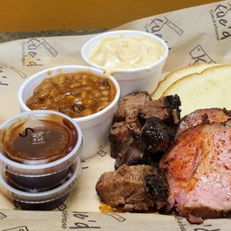 Smoked pork, burnt ends, baked beans, and mac and cheese. Smoked pork, burnt ends, baked beans, and mac and cheese.