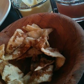 Chef Chen - Prawn crackers with soy sauce drizzled on top. On the side honey chilli sauce and horseradish sauce - Chinese Near Me - Smyrna, Georgia