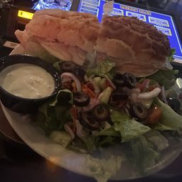 Not sure what they called it but it was a turkey sandwich on a Dutch crunch roll it was absolutely delicious and the salad was so yummy