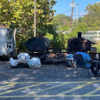 SmokeShack Ribs & BBQ - a man sitting in a chair in a parking lot - Barbeque Near Me - Fort Washington, Maryland SmokeShack Ribs & BBQ - a man sitting in a chair in a parking lot - Barbeque Near Me - Fort Washington, Maryland