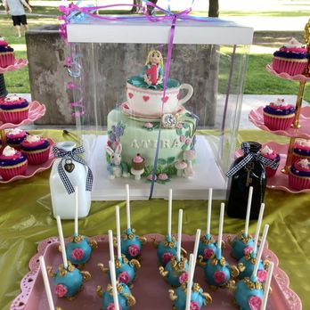 Cake Playhouse - Cheshire Cat Cupcakes, Teapot cakepops and the centerpiece; Atira's birthday cake! - Custom Cakes Near Me - Artesia, California Cake Playhouse - Cheshire Cat Cupcakes, Teapot cakepops and the centerpiece; Atira's birthday cake! - Custom Cakes Near Me - Artesia, California