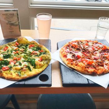 Virtuous Pie - On Left, Ultraviolet Pizza and on Right, Sweet Pepper + Sausage Pizza (Virtuous Pie in Portland, Oregon). - Pizza Near Me - Portland, Oregon Virtuous Pie - On Left, Ultraviolet Pizza and on Right, Sweet Pepper + Sausage Pizza (Virtuous Pie in Portland, Oregon). - Pizza Near Me - Portland, Oregon