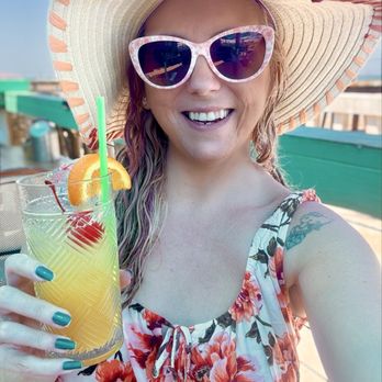 Funky Pelican - Enjoying a beach drink! - Seafood Near Me - Flagler Beach, Florida