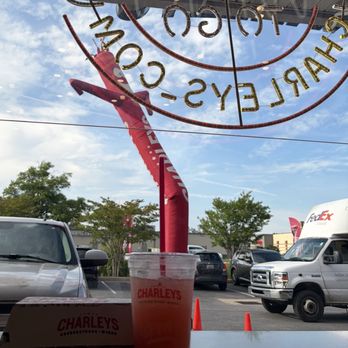 Charleys Cheesesteaks - Window to exterior/parking lot Chicken California Cheesesteak Boxed Meal Strawberry Lemonade - Fast Food Near Me - Glen Burnie, Maryland Charleys Cheesesteaks - Window to exterior/parking lot Chicken California Cheesesteak Boxed Meal Strawberry Lemonade - Fast Food Near Me - Glen Burnie, Maryland