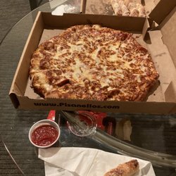Pisanello's Pizza - Breadsticks, pepperoni pizza with extra cheese. DELICIOUS!