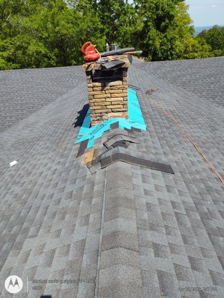 Slide of Mike's roofing and repairs