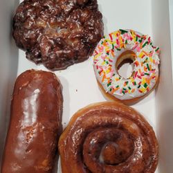 Donut Palace - Apple fritter, vanilla frosted raised, cinnamon roll, Bavarian cream filled donuts