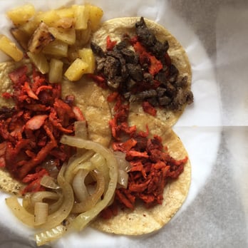 Tacos El Regio - 2 tacos de trompo (aka al pastor) and 1 taco campechano. Notice the roasted pineapples and onions that come with each order! - Mexican Near Me - Charlotte, North Carolina Tacos El Regio - 2 tacos de trompo (aka al pastor) and 1 taco campechano. Notice the roasted pineapples and onions that come with each order! - Mexican Near Me - Charlotte, North Carolina