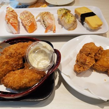 元氣壽司 - Sushi Set (back): Crab Stick, Salmon, Shrimp, Scallop, and Egg - $50  Deep-Fried Oyster (left) - $35  Side Dish (right): Deep Fried Chicken - Conveyor Belt Sushi Near Me - Hong Kong, HK