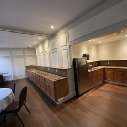 Duggan's Serra Mortuary - Henrietta Reception Room. Kitchen and long counter for placing food.