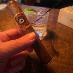 The Cigar Box - Perdomo Habana and of course Tito's/ Tonic