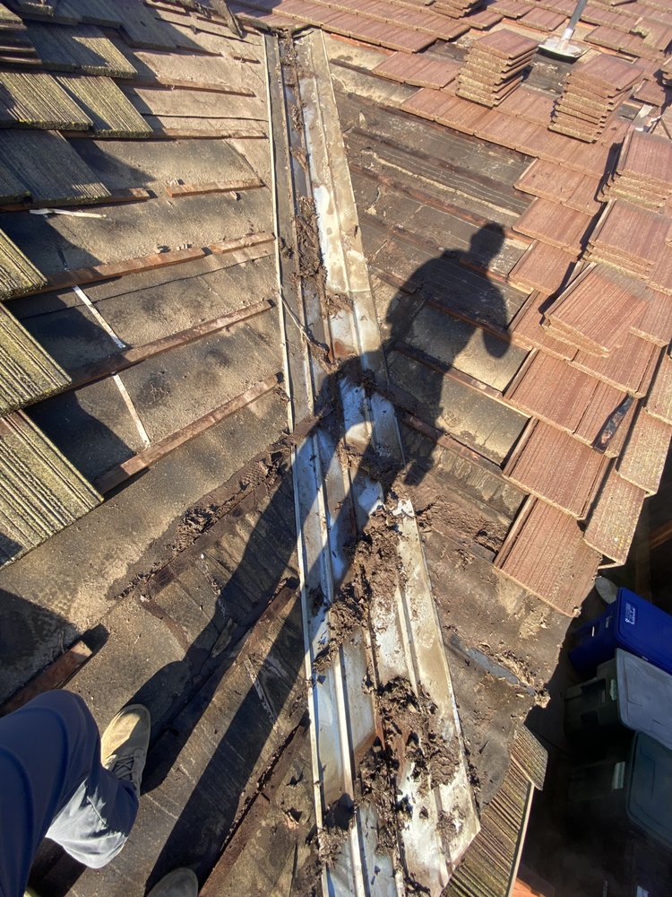 Slide of Octavio Sajuan Roofing