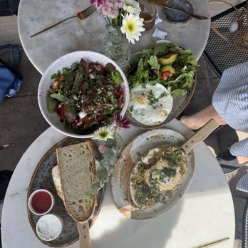 Ivy Café - Steak salad, grand tartine (I think with whipped feta pistachios and honey) added an egg on top, morning salad, morning sandwich. - Coffee & Tea Near Me - Clayton, Missouri