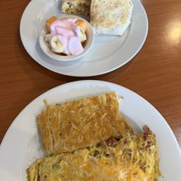 All meat omelette and carnitas breakfast burrito All meat omelette and carnitas breakfast burrito