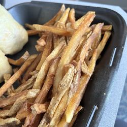 Snacks On The Go - Fries looked over cooked but tasted great likely old oil caused darker brown color.