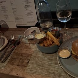Happy Hour items: Petite Steak and Frites; Burger; Fries