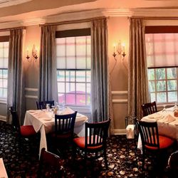 Curtains Boutique - Contemporary Drapery Side Panels on TRAX Hardware over Alta Roller Shades in Italian Restaurant