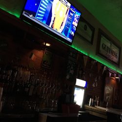 The Well - Big screens w green for St Patty's Day