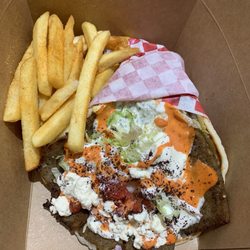 Turkish Cuisine - Lamb Gyro with hot sauce and garlic sauce. $15 at Turkish Cuisine at Washington Square Mall food court. So good! Highly recommend.