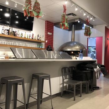 Ripe Tomato Pizza - the counter and bar area - Pizza Near Me - Edmonton, Alberta Ripe Tomato Pizza - the counter and bar area - Pizza Near Me - Edmonton, Alberta