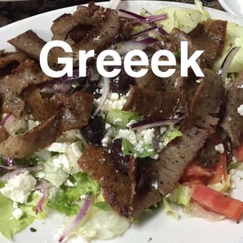 Chris' Taverna - Gyro salad!!! Amaaaazing!!! Ate a little before taking the picture too! - Greek Near Me - Boynton Beach, Florida Chris' Taverna - Gyro salad!!! Amaaaazing!!! Ate a little before taking the picture too! - Greek Near Me - Boynton Beach, Florida