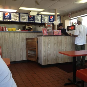 Mr J's - a man standing at the counter - Greek Near Me - Rockford, Illinois Mr J's - a man standing at the counter - Greek Near Me - Rockford, Illinois