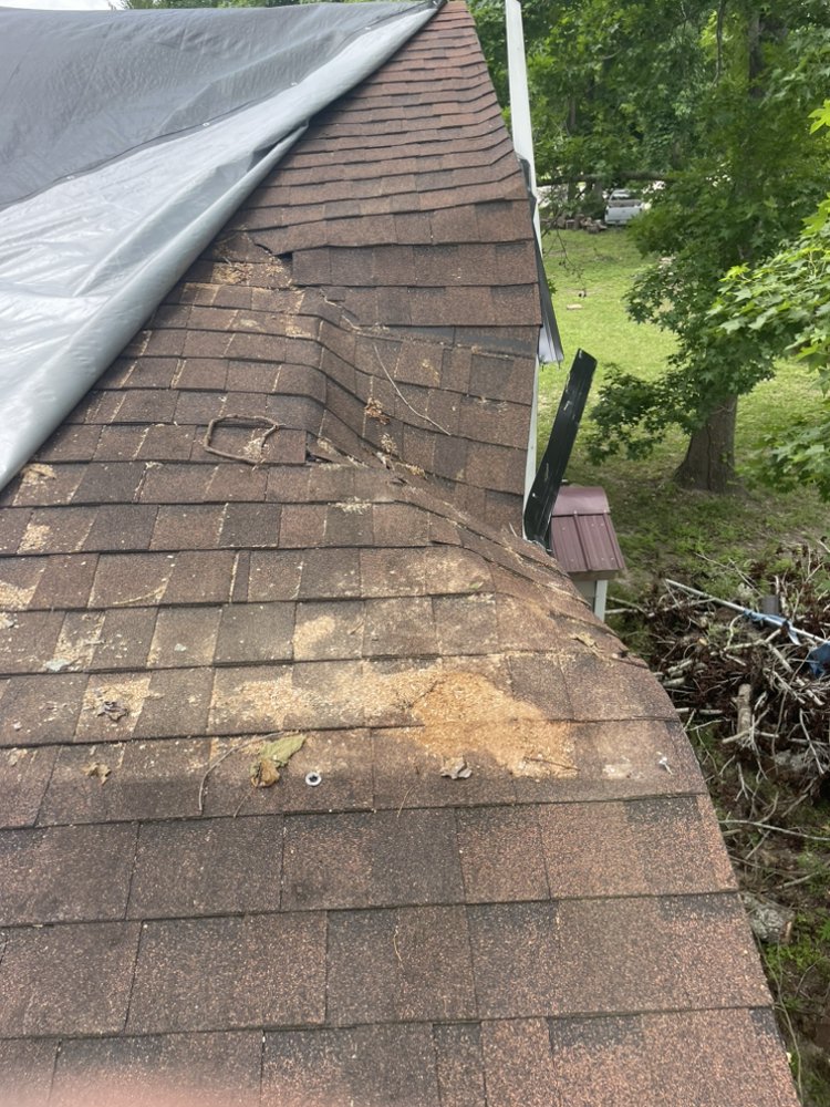 Slide of Leger’s Roofing & Con