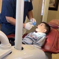 Riverside Smiles Dentistry - My boy getting evaluated by Doctor Akarri.