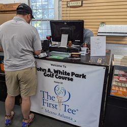 Inside the golf shop on Sunday, October 13, 2024. Shelton was in charge. Checking in.