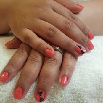 Peridot Nails & Spa - Pink glitter with black gem bow - Nail Salons Near Me - Monrovia, California Peridot Nails & Spa - Pink glitter with black gem bow - Nail Salons Near Me - Monrovia, California