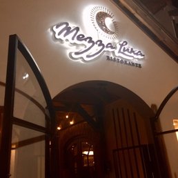 Exterior outside entrance of Mezza Luna Ristorante - Neptune Beach, Florida Exterior outside entrance of Mezza Luna Ristorante - Neptune Beach, Florida