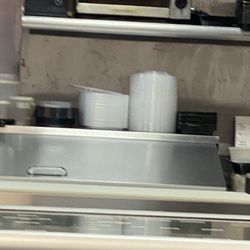 Hawaii Grill & Sushi - Dirty walls. Employees sitting on their cell phones not interested in a clean place.