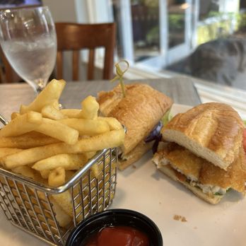 Lazy Lobster - The Po Boy flounder sandwich with seasoned fries - Seafood Near Me - Longboat Key, Florida Lazy Lobster - The Po Boy flounder sandwich with seasoned fries - Seafood Near Me - Longboat Key, Florida