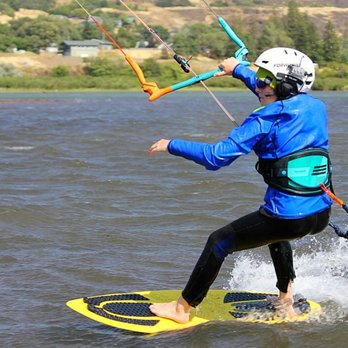 Oregon Kiteboarding - Grom student working on riding a skimboard - Kiteboarding Near Me - The Dalles, Oregon
