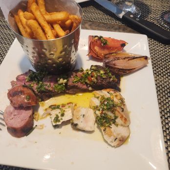 Jolie American Bistro - Half of the Argentinian Steak,  Chicken,  Chorizo meal.  I don't remember it's name.  Outstanding! - Beer Bar Near Me - Palm Bay, Florida