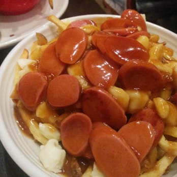 La Belle et La Boeuf - Poutine with Nathan's Hot Dog sausage. - Sports Bars Near Me - Anjou, Quebec