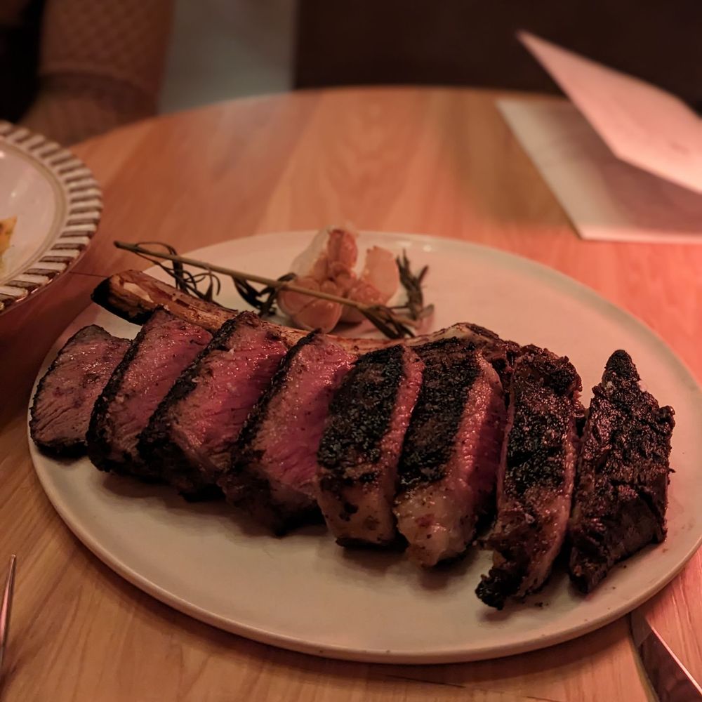 Prime Bar - Chicago - Nisos Prime Signature Cut: Wood Grilled 22 oz Bone-in Ribeye - Cocktail Bars Near Me - Chicago, Illinois Prime Bar - Chicago - Nisos Prime Signature Cut: Wood Grilled 22 oz Bone-in Ribeye - Cocktail Bars Near Me - Chicago, Illinois