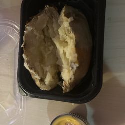 Wendy's - WTF is this???? Asked for extra cheese on the side. They freaking give me a plain potato.  F-ing place