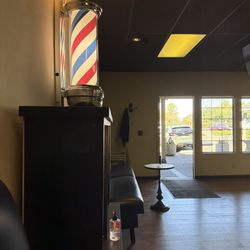 The Barber Lounge - The old barber shop light!