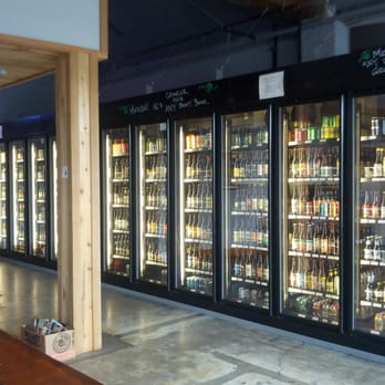 Oly Taproom - Bottle selection. Imports on the far left, new beers on the far right. - Beer Bar Near Me - Olympia, Washington Oly Taproom - Bottle selection. Imports on the far left, new beers on the far right. - Beer Bar Near Me - Olympia, Washington