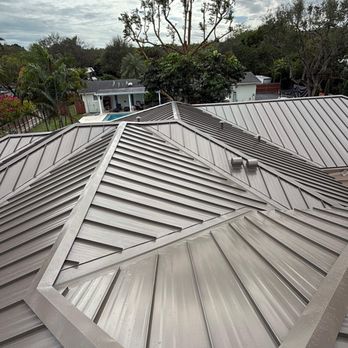 Florida Roofing Systems - Standing seam dark bronze metal Install - Roofing Near Me - Coral Gables, Florida Florida Roofing Systems - Standing seam dark bronze metal Install - Roofing Near Me - Coral Gables, Florida