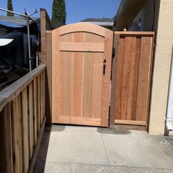 J&K Fencing - 6 ft tall board on board fence with semi costom arch
