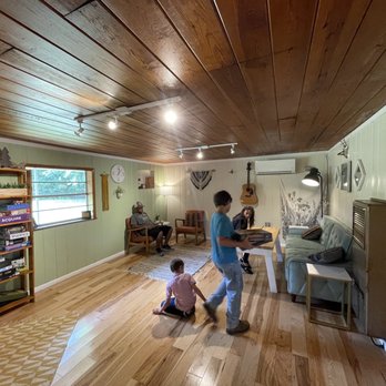 Simply Risen Coffeehouse - a woman and a child in a living room - Coffee & Tea Near Me - Ozark, Arkansas