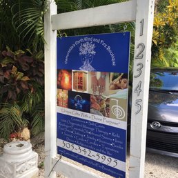 Signage for Esmeralda's Earth, Wind and Fire Boutique... why the discrimination against Water and Aether/Quintessence?