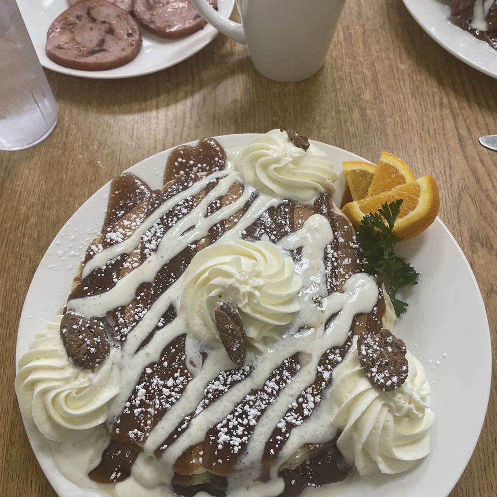 Pancakes with cream cheese drizzle and homemade whipped cream Pancakes with cream cheese drizzle and homemade whipped cream