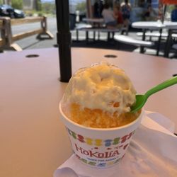 Hokulia Shave Ice - Snow cap means topped with condensed milk. Yum!  This is a small. Pretty BIG! Can choose up to 3 flavors. I did Guava, Lychee, Passion Fruit