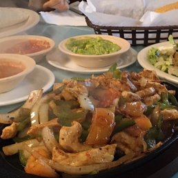 Chicken fajita with the extra toppings (to the right) the other entree was the California burrito. Chicken fajita with the extra toppings (to the right) the other entree was the California burrito.