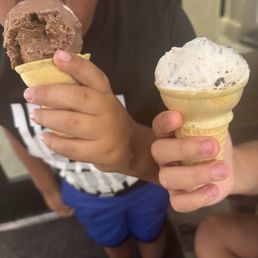 Single scoops of rocky road and cookies and cream.